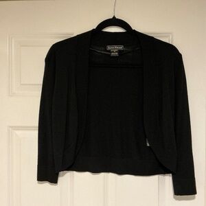 Black sweater by Jessica Howard, size medium. Open front with 3/4” sleeves.